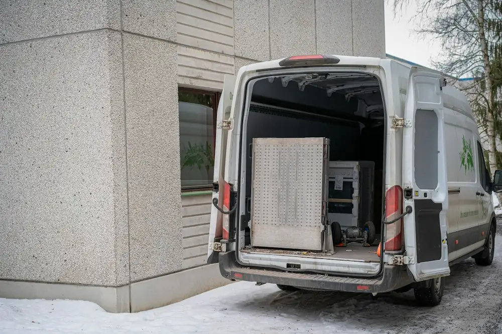 Removal van with doors open and boxes loaded