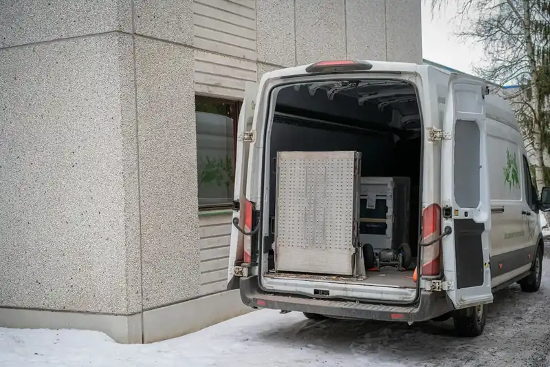 Removal van with doors open and boxes loaded